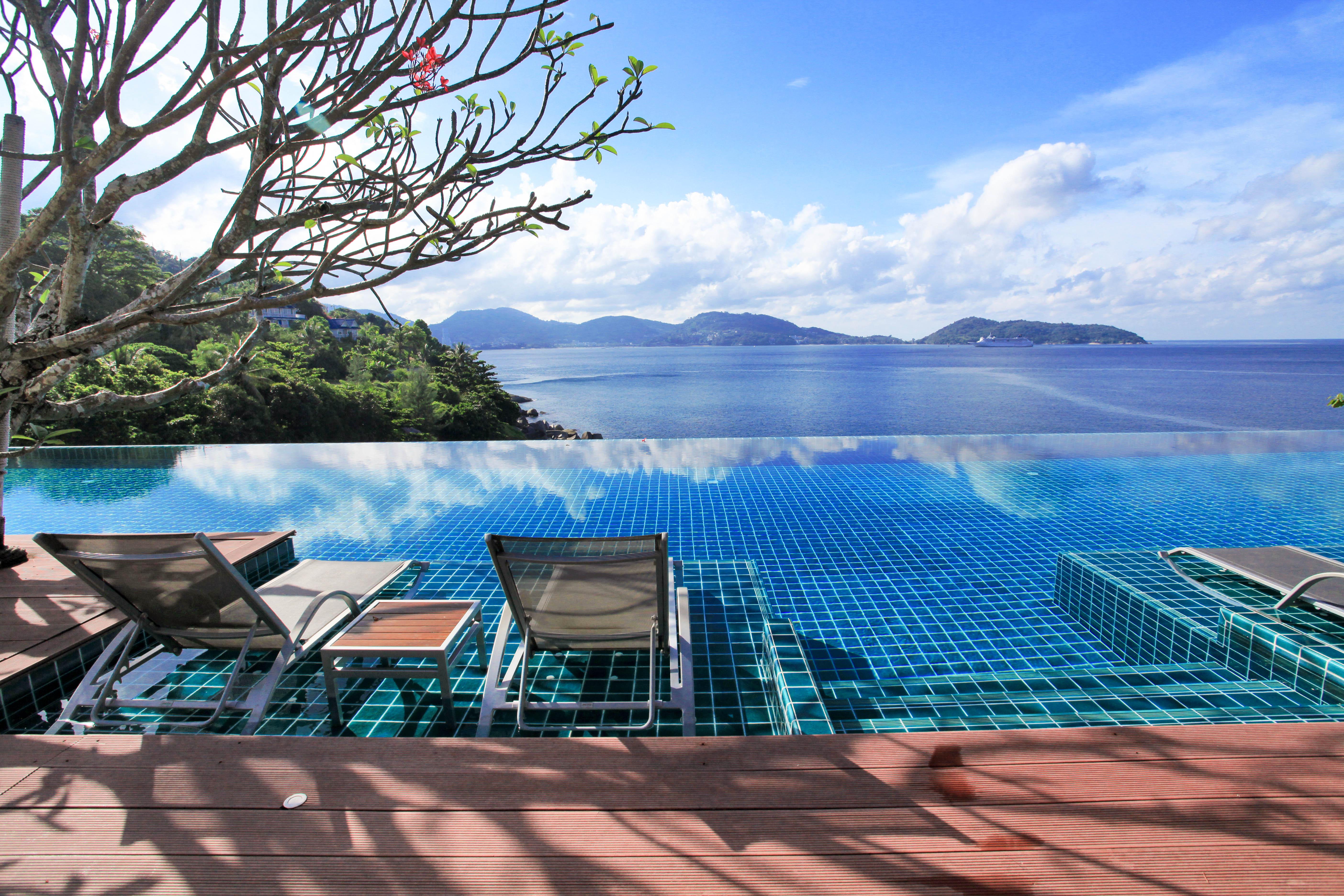 Zenmaya Oceanfront Phuket, Trademark Collection By Wyndham Patong Экстерьер фото Infinity pool at a resort in Phuket, Thailand